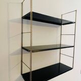Adjustable vintage wall shelf in black metal and brass