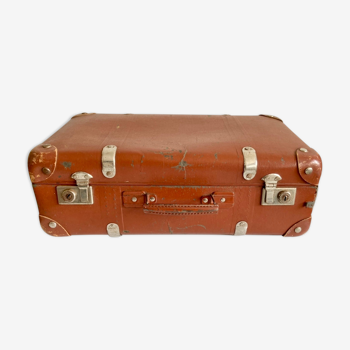 Small old brown suitcase