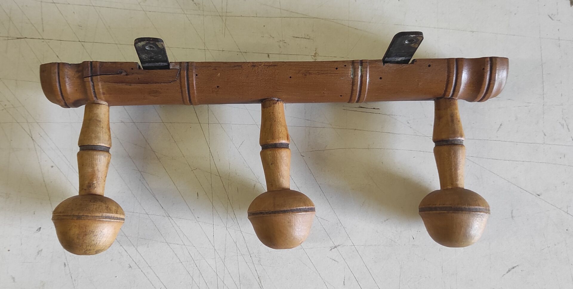 Wall-mounted coat rack in solid wood - mid 20th century