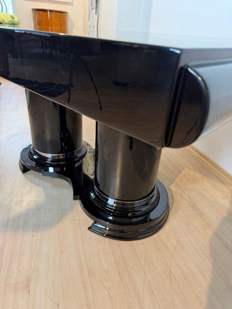 Art Deco dining table in black piano lacquer & metal, 1930