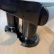Art Deco dining table in black piano lacquer & metal, 1930