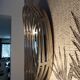 Oval wall mirror in chrome metal