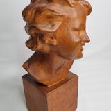 Bust of a laughing child in patinated plaster, 35 cm