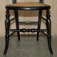 Four antique Regency bergère chairs with mother-of-pearl inlay.
