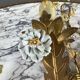 Pair of Maison Baguès wall lights with porcelain flowers, early 19th century