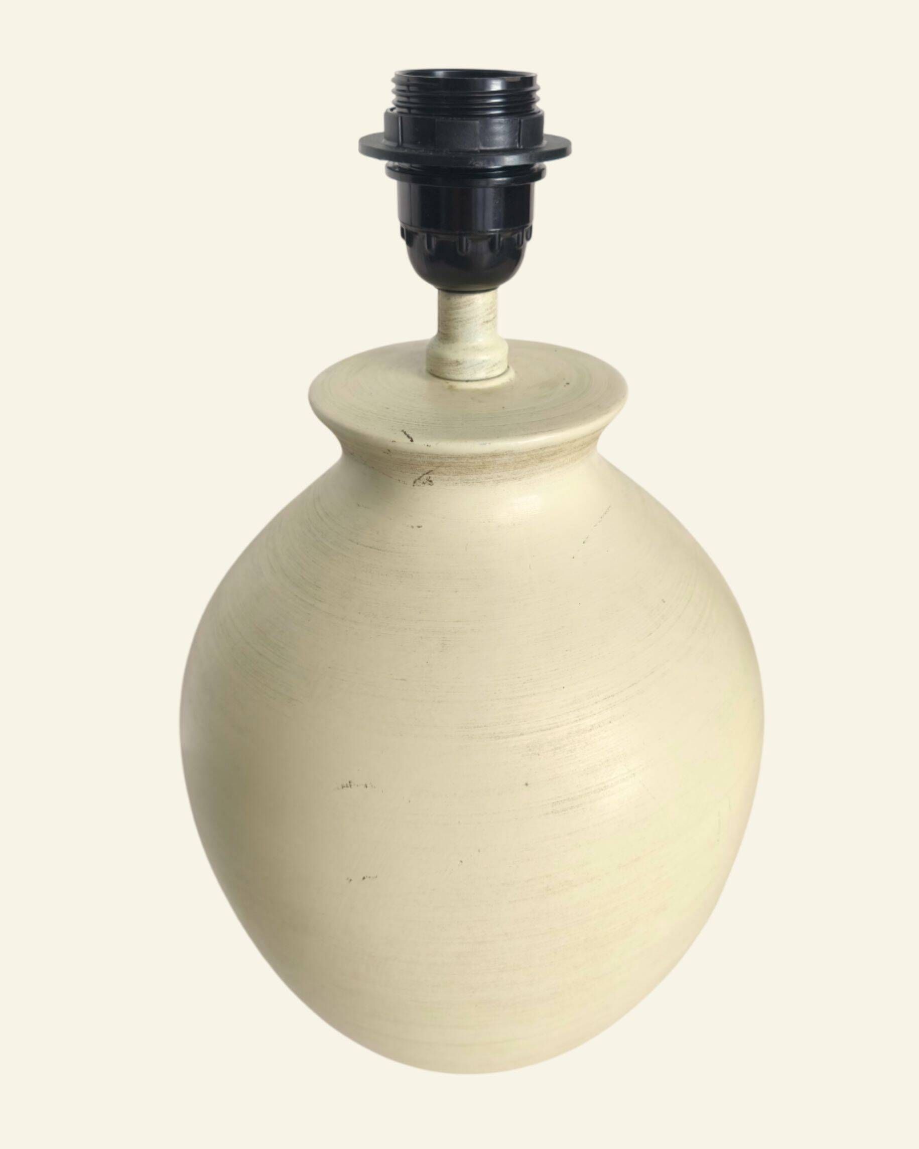 Ceramic lamp base turned in sand colour, organic shape.