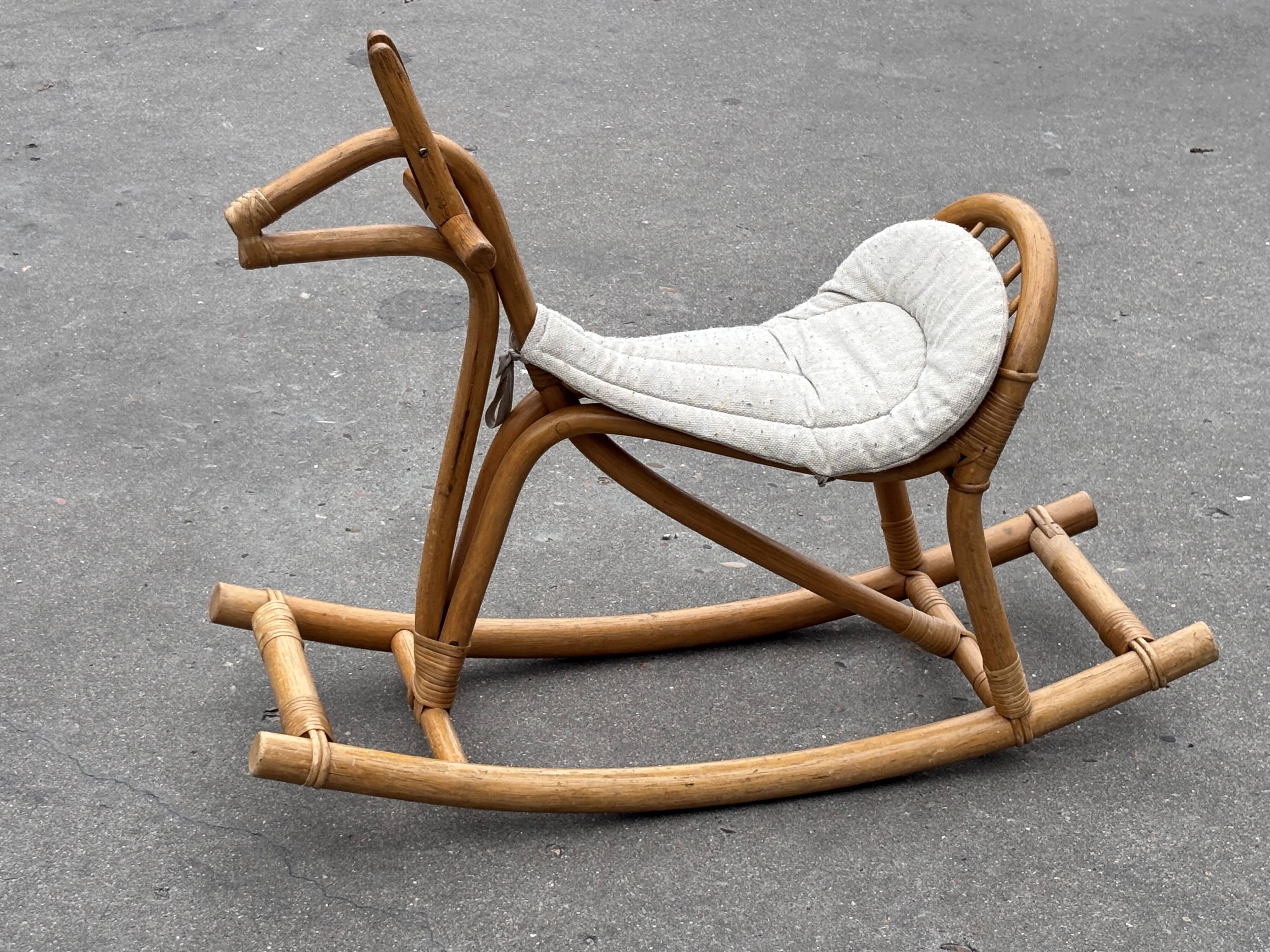 Vintage rattan rocking horse for a 1960s nursery design
