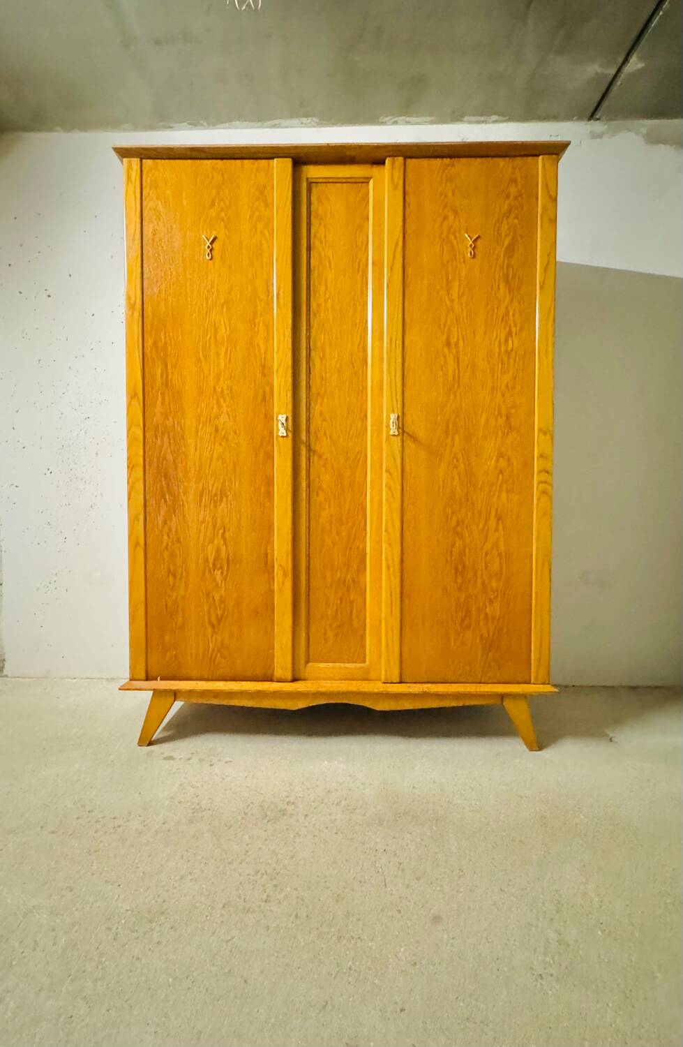 Vintage Parisian wardrobe with compass feet from the 60s