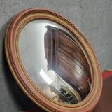 Miroir en bois doré patiné « oeil de sorcière » époque 1900  glace bombée e