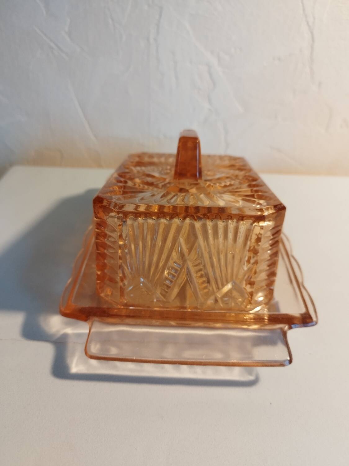 Pink glass butter dish