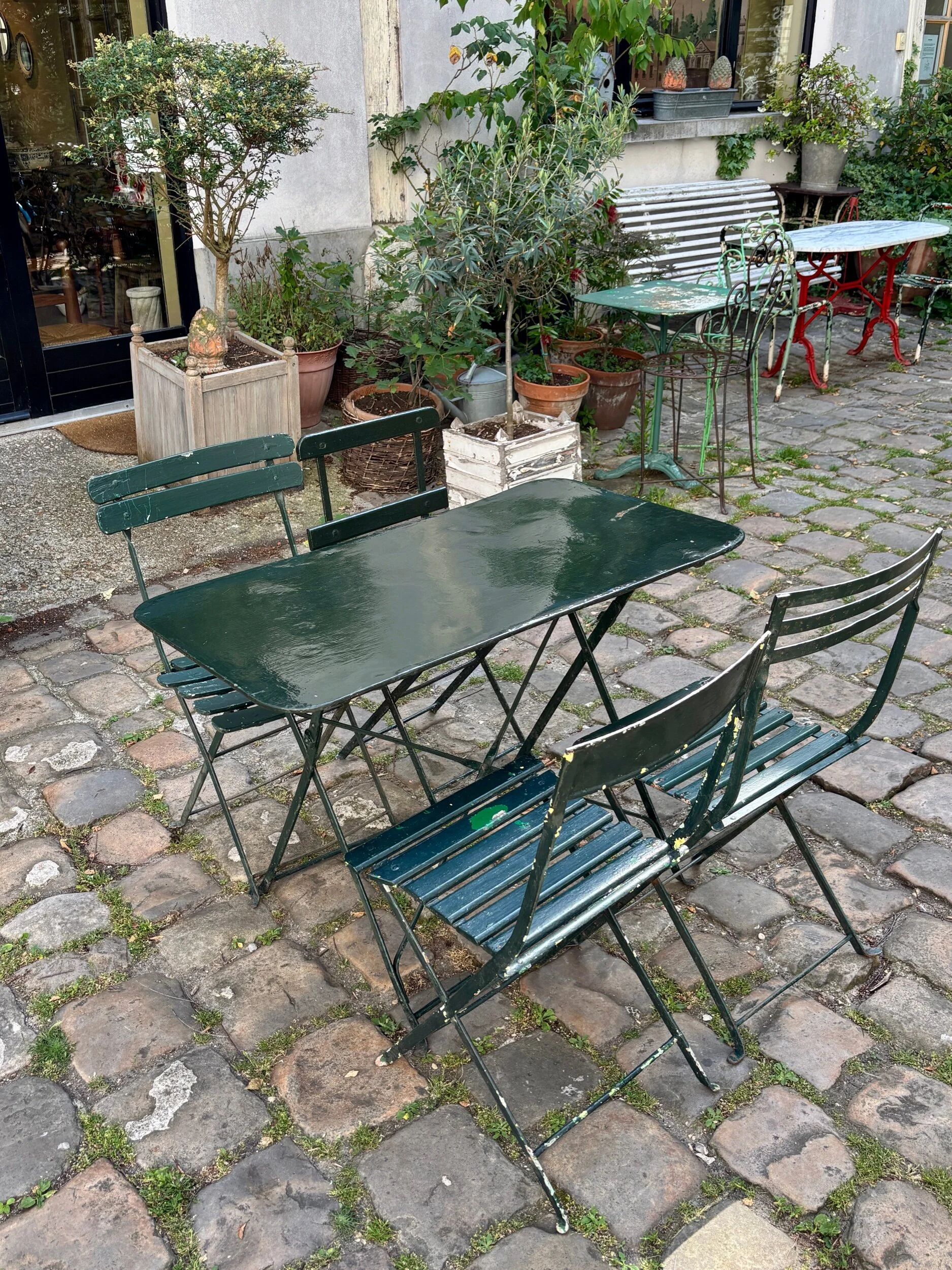 Salon de jardin, table et 4 chaises pliantes en métal vert