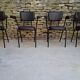 Brown faux leather armchairs