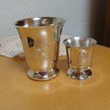 Timbale and egg cup set in silver.