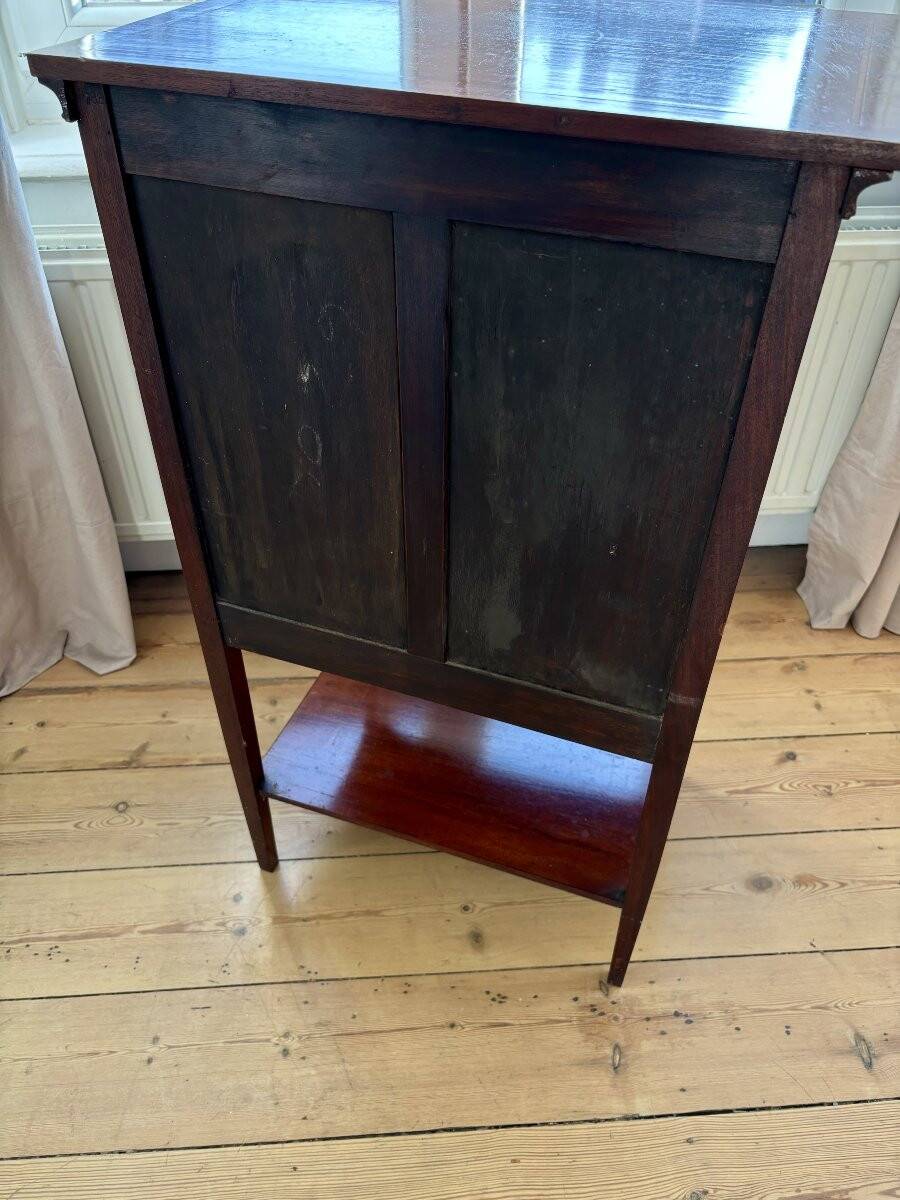 Edwardian storage unit known as a "music cabinet"
