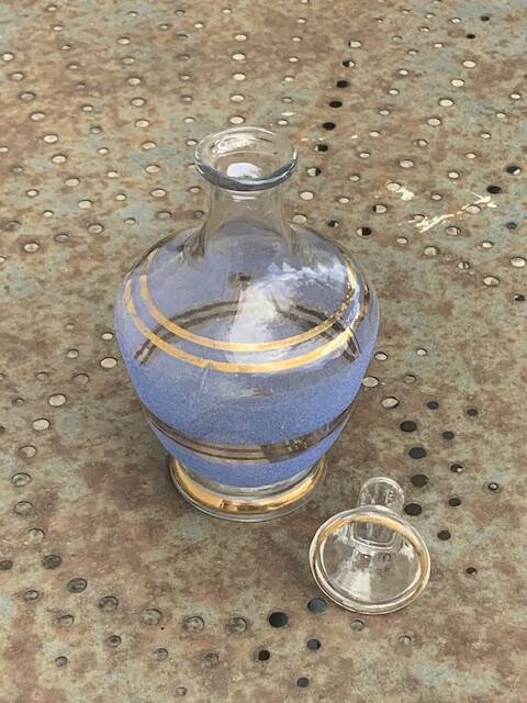 Blue granite glass carafe with vintage gold trim.