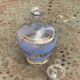 Blue granite glass carafe with vintage gold trim.