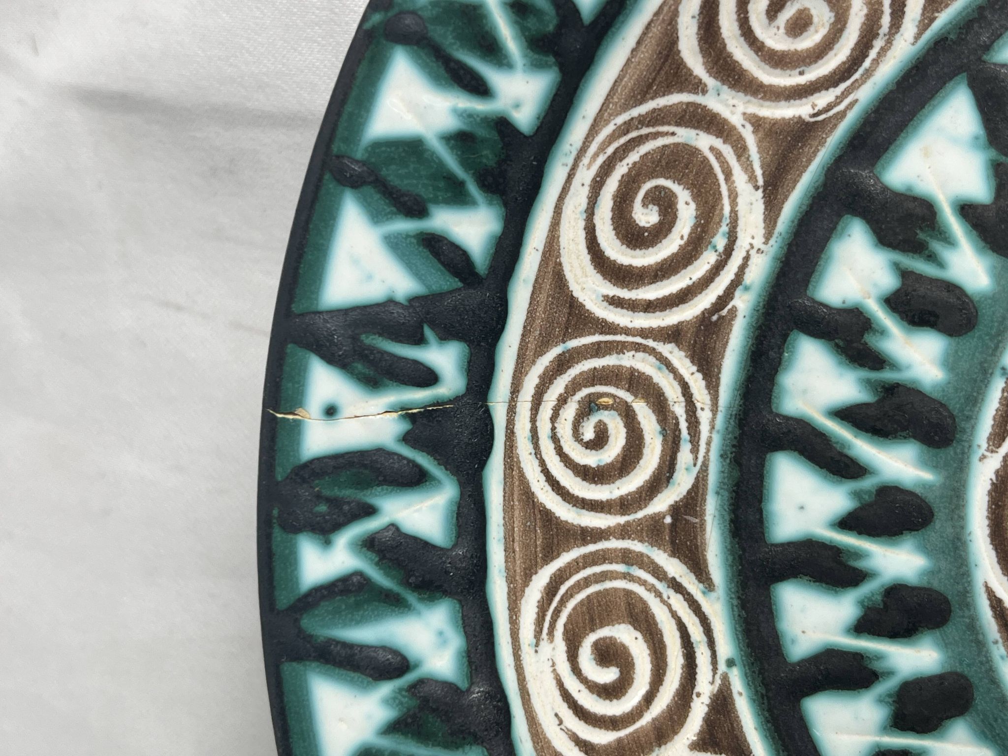Picault, polychrome earthenware plate with geometric decoration from the 20th century.