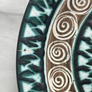 Picault, polychrome earthenware plate with geometric decoration from the 20th century.