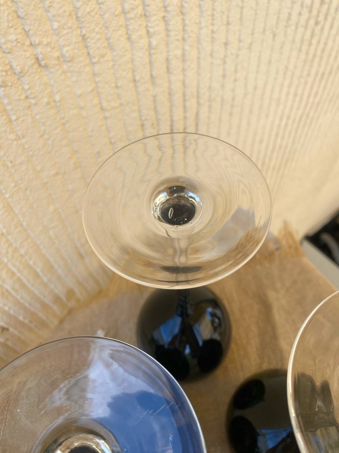 Footed glasses in blown purple bubble glass, Murano style.