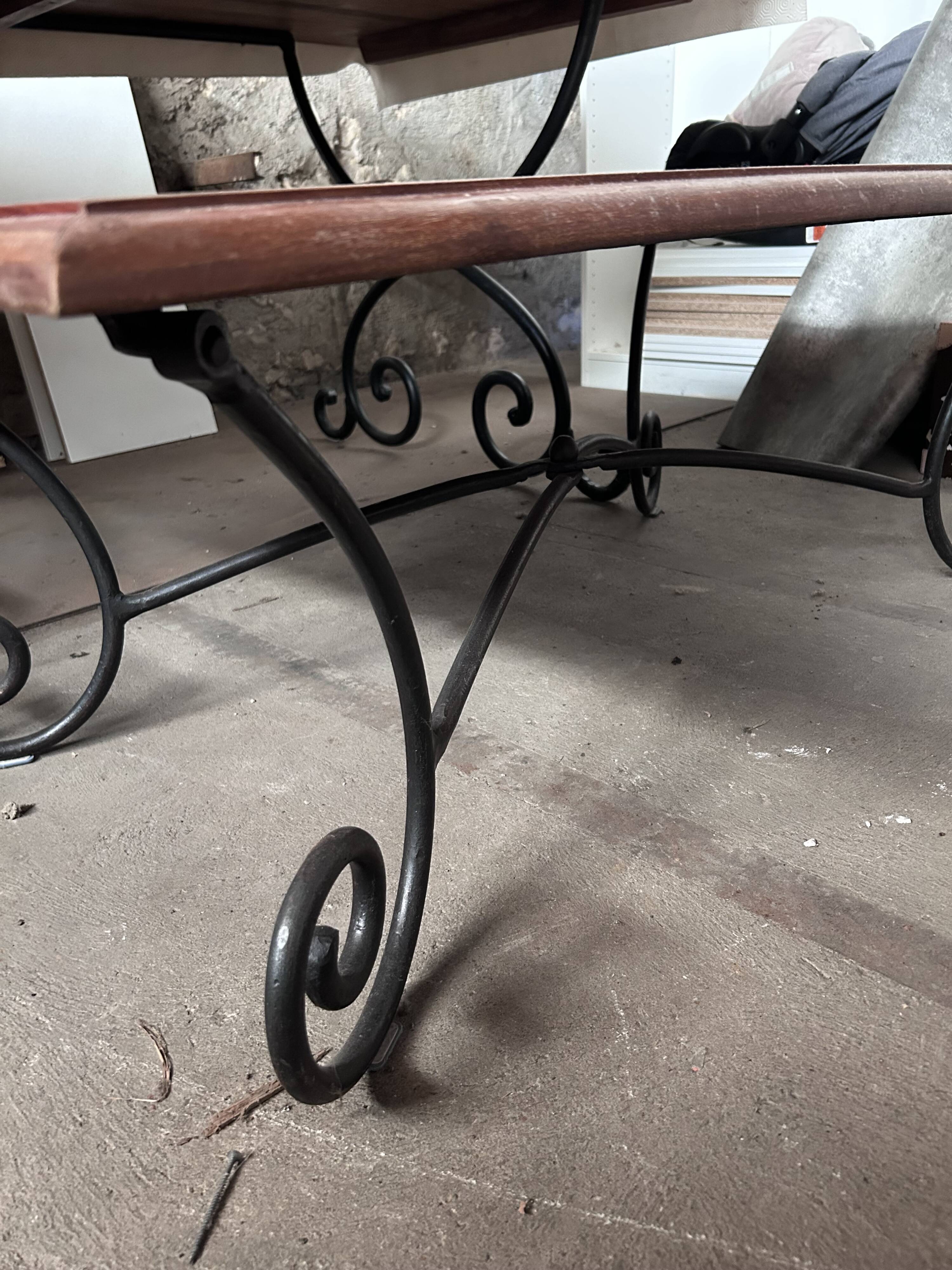 Coffee table in rosewood and wrought iron