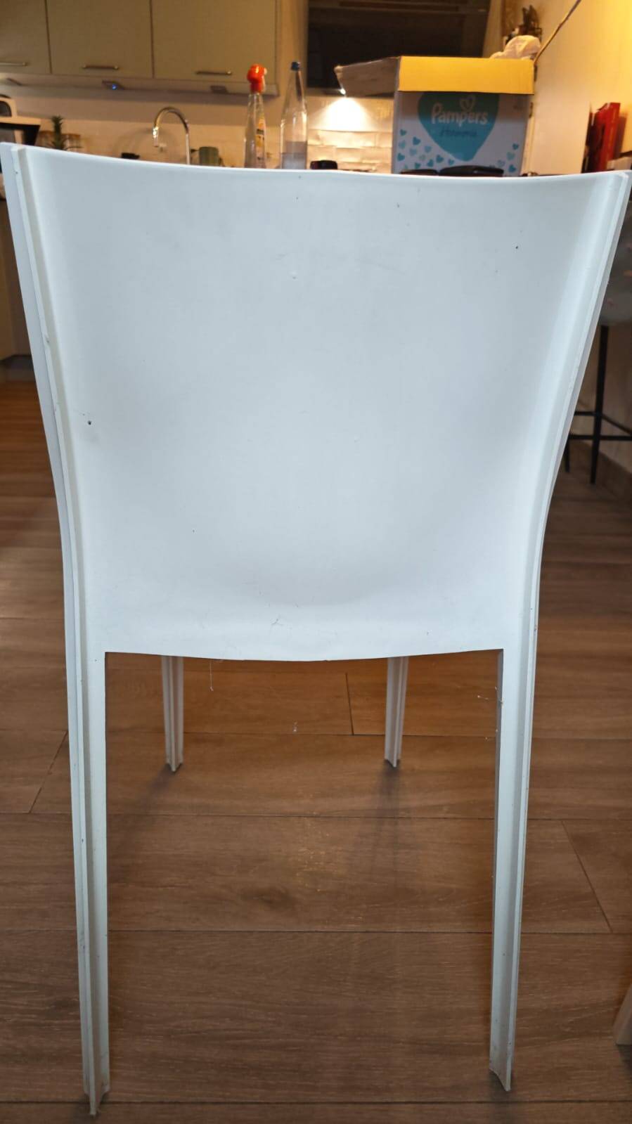 Lot of 4 Kartell "Slick" chairs designed by Philippe Starck - off-white.