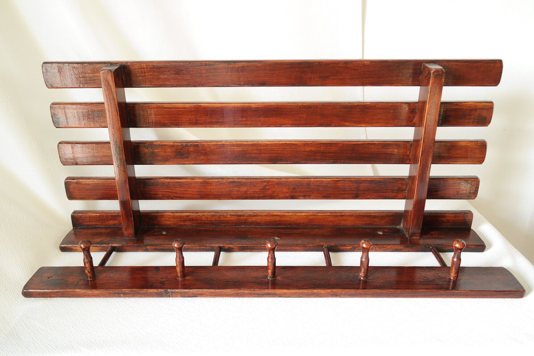 Vintage dark wood wall coat rack