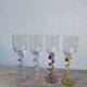4 large, multicoloured, twisted champagne flutes