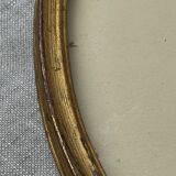 Old oval shaped wooden frame