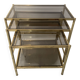 Suite de trois tables gigognes de style en laiton et verre fumé XX siècle