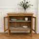 Art Deco sideboard in raw wood with a wax finish, closed by 2 glass doors.