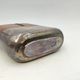 Silver-plated metal flask with leather and glass