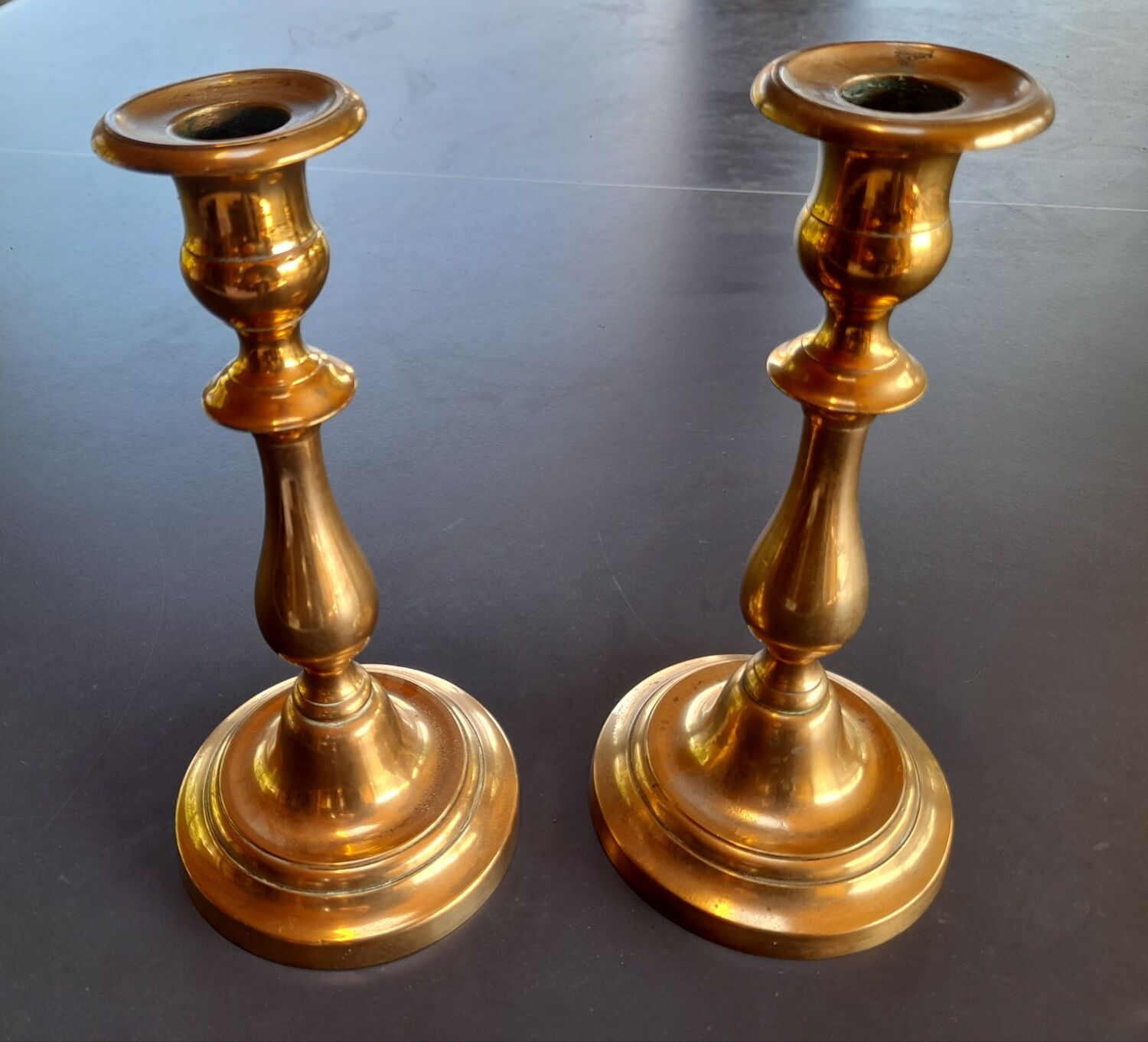 Pair of bronze candle holders old