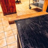 Antique bar stool with wooden seat