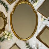 Miroir vintage doré en bois