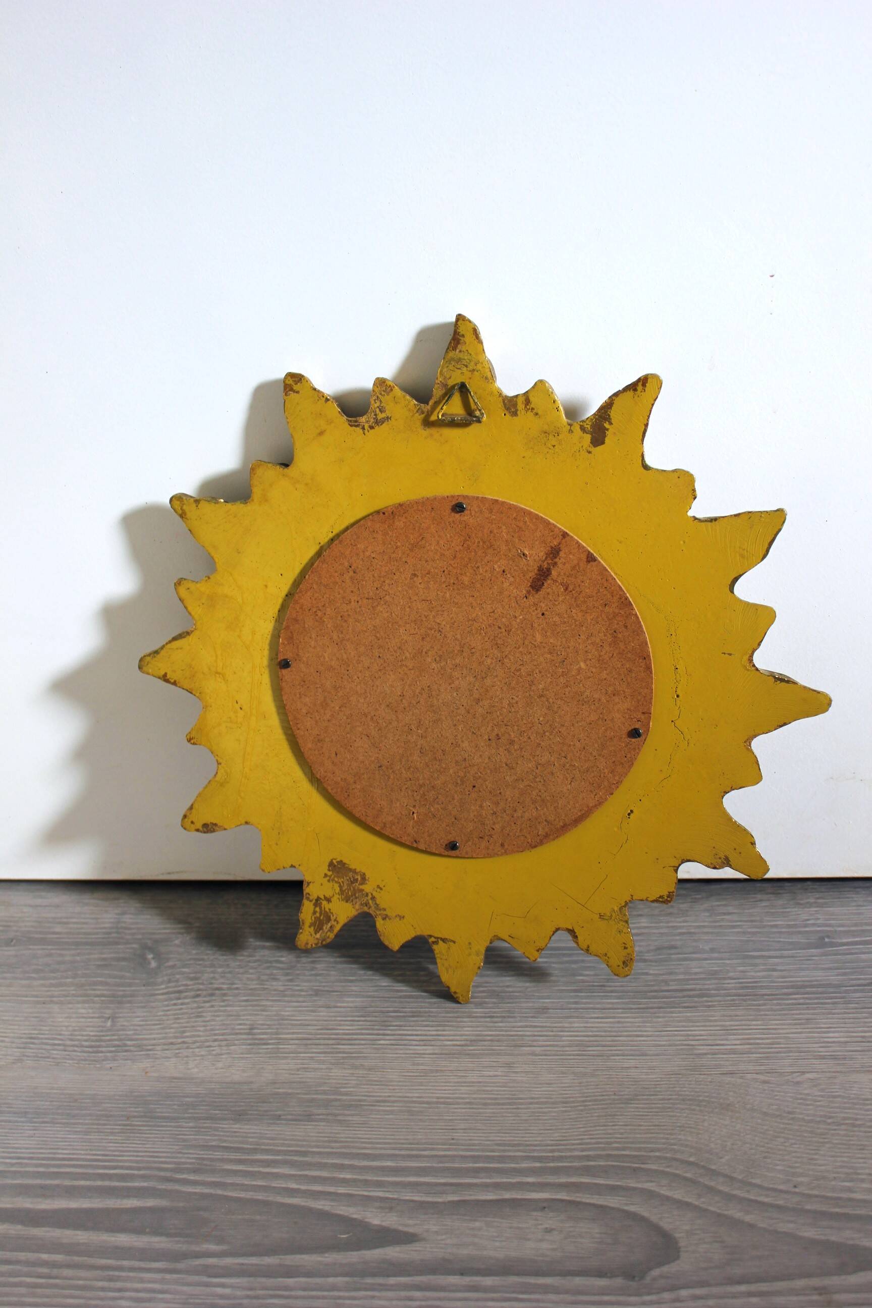 Golden sunburst convex vintage mirror from the 1960s.