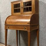 Cylinder desk topped with a Louis XVI style marquetry display case