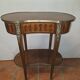 Kidney-shaped side table in Louis XVI style with marquetry.