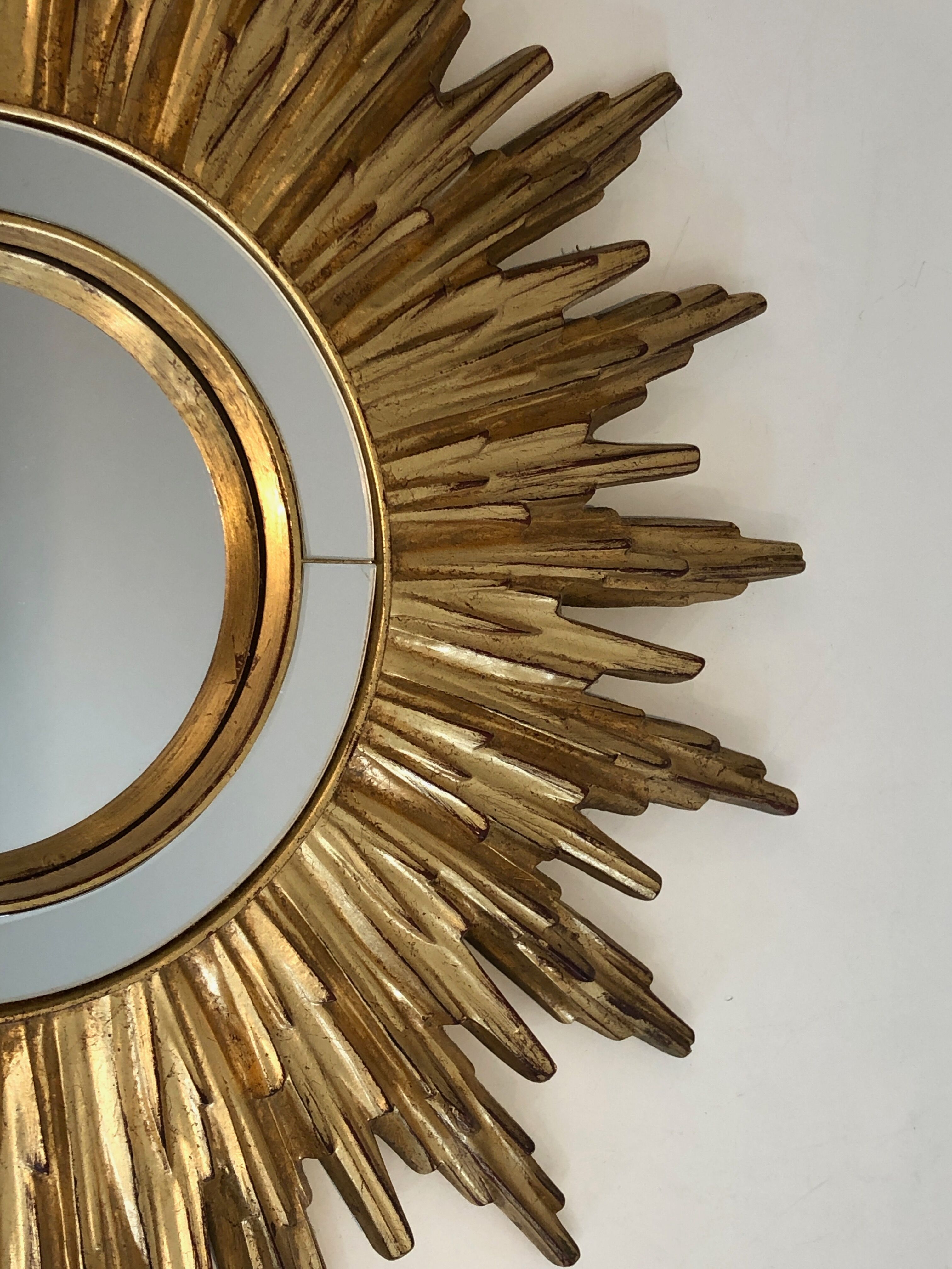 Sun mirror in golden resin 50cm