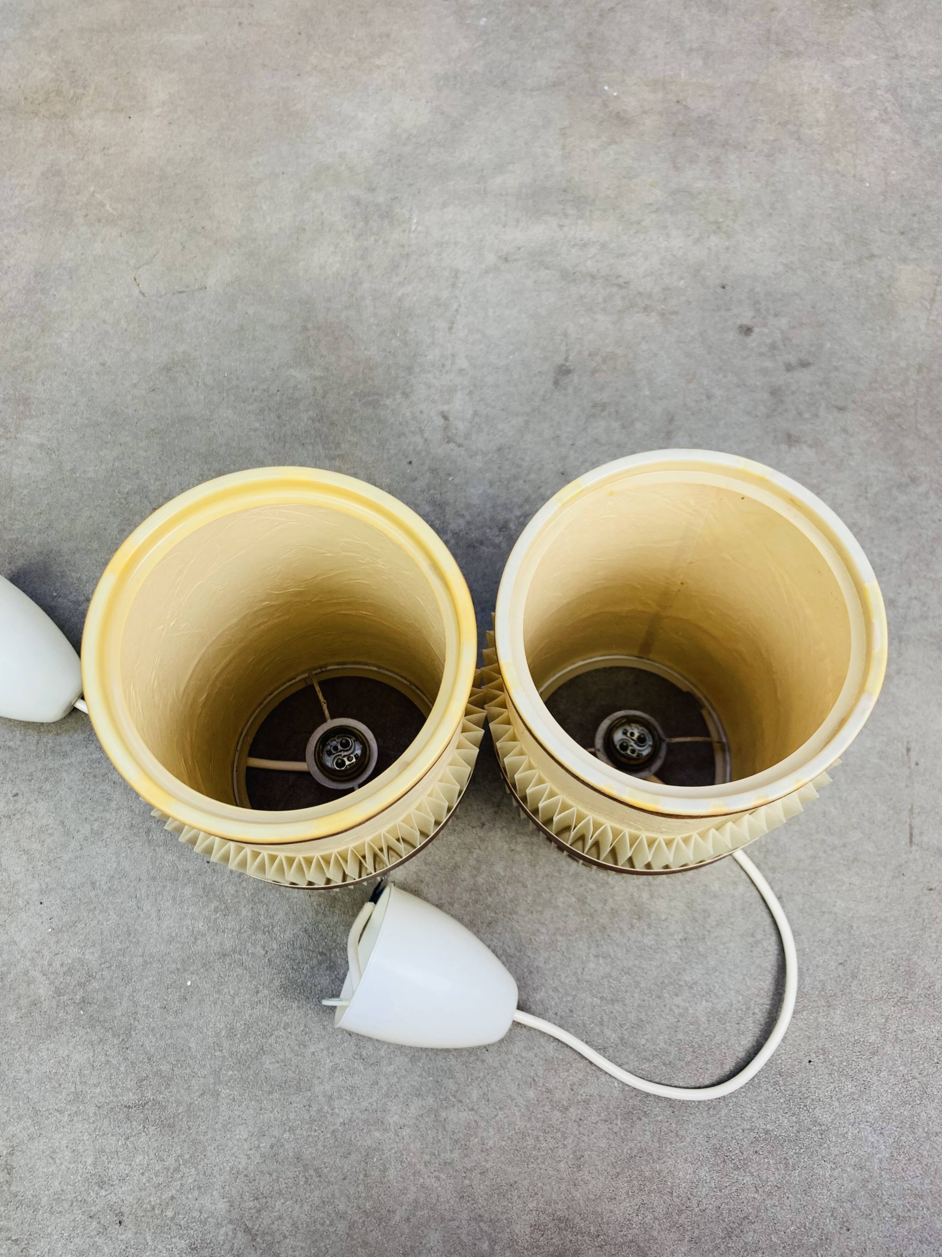 Pair of roller suspensions from the 70s, paper