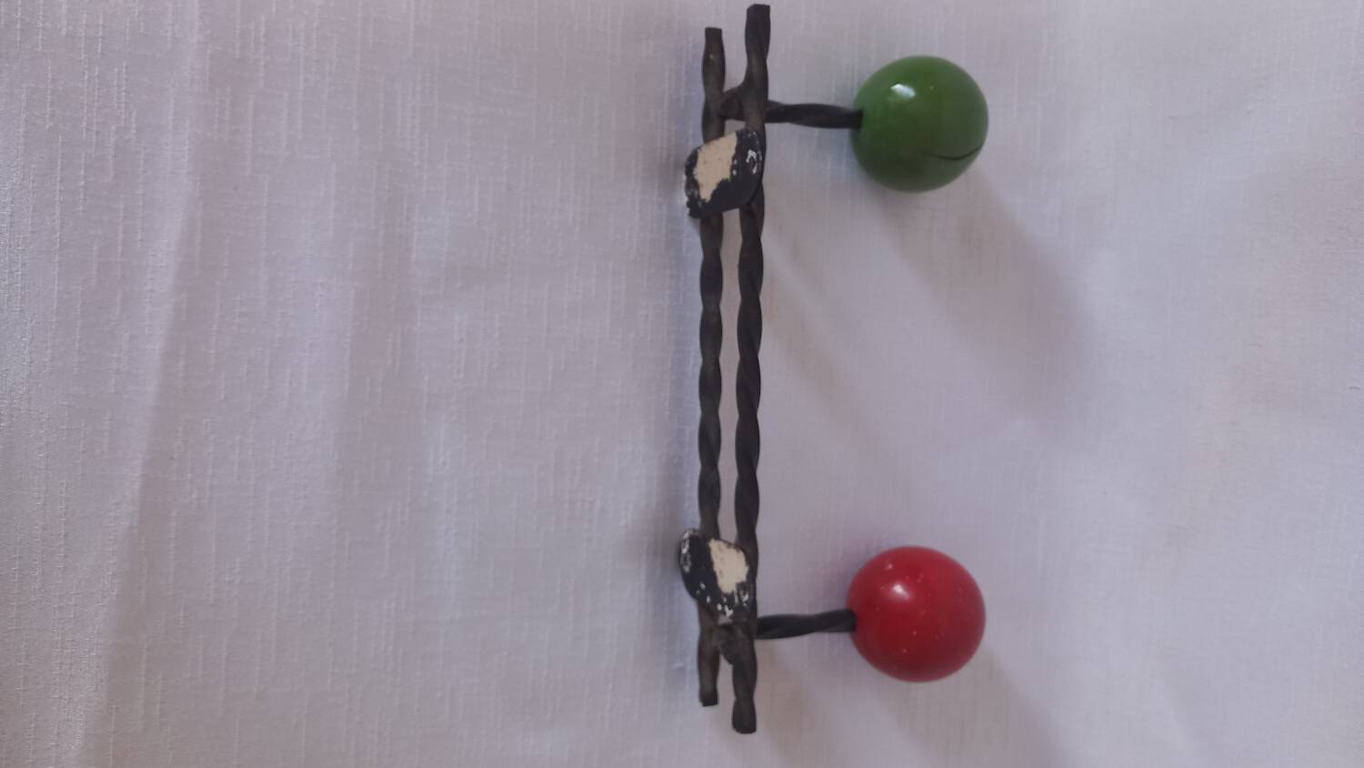Vintage ball and metal coat racks