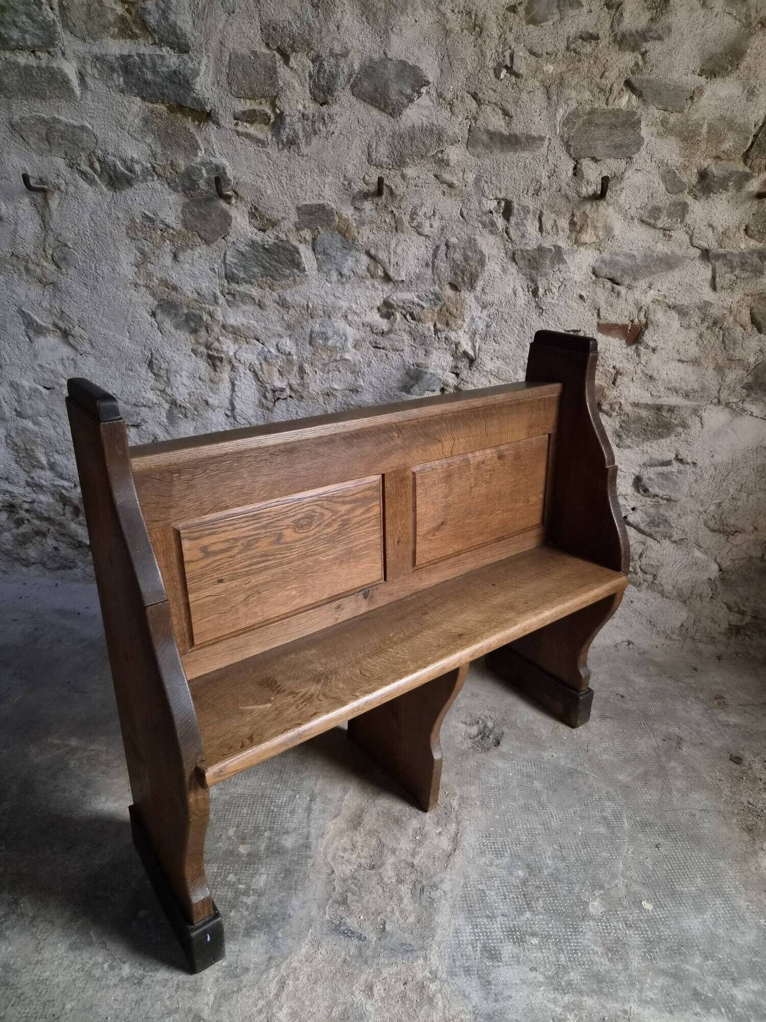 Antique church bench in oak, circa 1900–1920