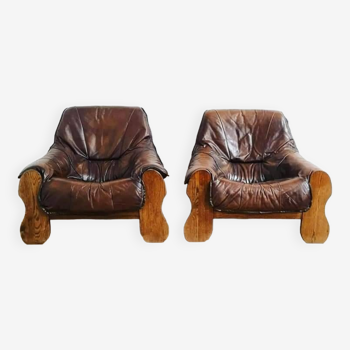 Pair of brutalist armchairs in leather and wood