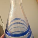 Conical glass vase/carafe blown with a blue spiral decoration.