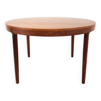 Vintage Danish round table from the 60s in rosewood with extensions, by Harry Ostergaard