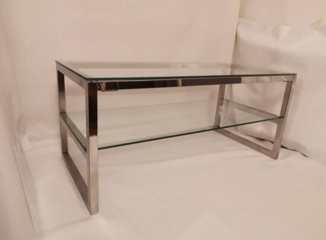 1980s coffee table with a double chrome metal top.