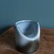 Vase Virebent porcelain cylindrical roll shape with a deep neck.