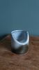 Vase Virebent porcelain cylindrical roll shape with a deep neck.