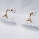 vintage wall lights in brass and pleated opal glass