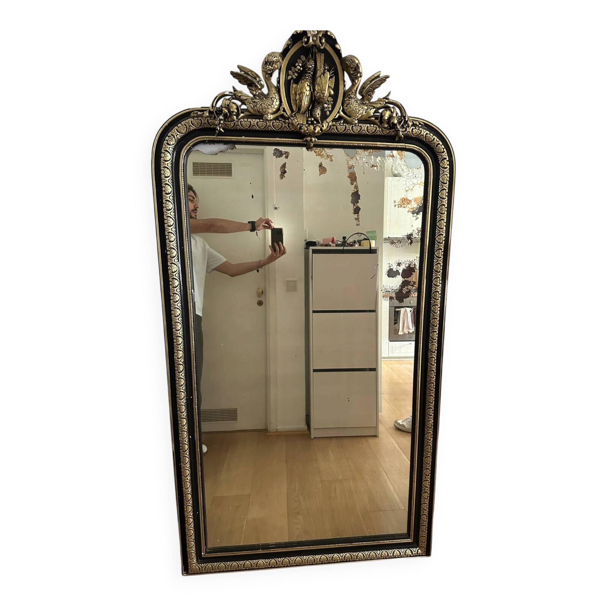 Napoleon III mirror with a pediment featuring black and gold dragons and birds.