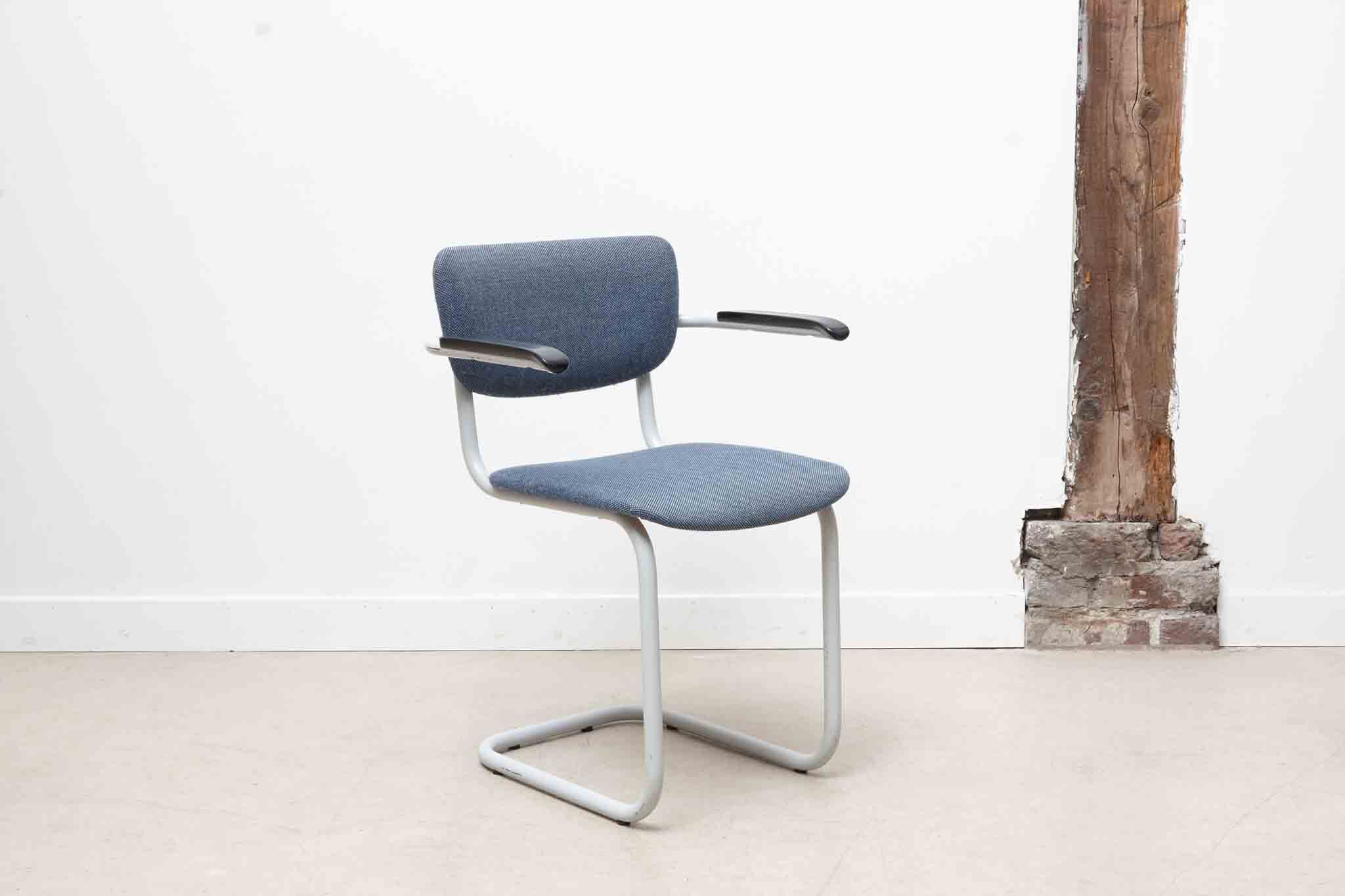 Blue fabric S-shaped chair with armrests